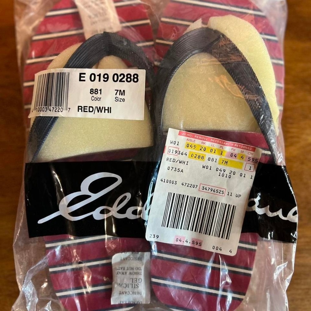 Red and white striped flip flops